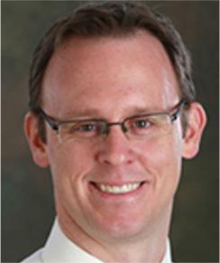 Michael E. Thomas, M.D.